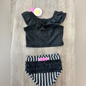 Brand new Ruffle Butts black and white stripe ruffled tankini. 2T